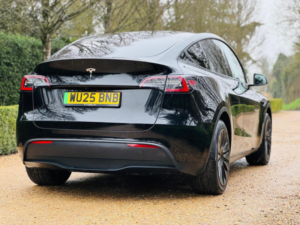 2025 Tesla Model Y Long Range Auto Rwd 5dr in Black — image 4
