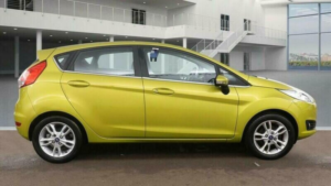 2014 Ford Fiesta 1.6 Zetec Powershift Euro 5 5dr in Yellow — image 5