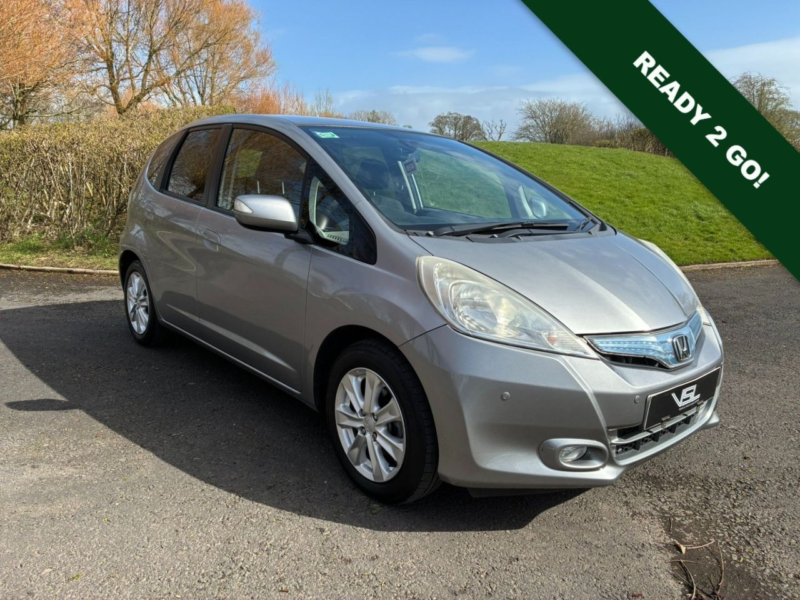 2012 Honda Jazz 1.3h Ima Hs Hatchback 5dr Petrol Hybrid CVT Euro 5 (102 Ps) in Silver — image 1