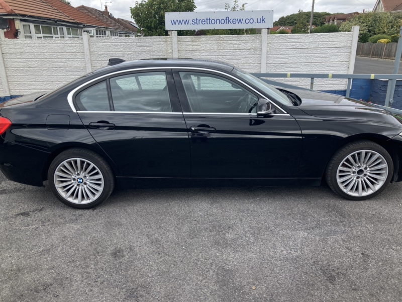 2014 BMW 3 Series 2.0 320d Xdrive Luxury in Black — image 1