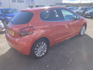 2017 Peugeot 208 1.2 Puretech Allure in Orange — image 4