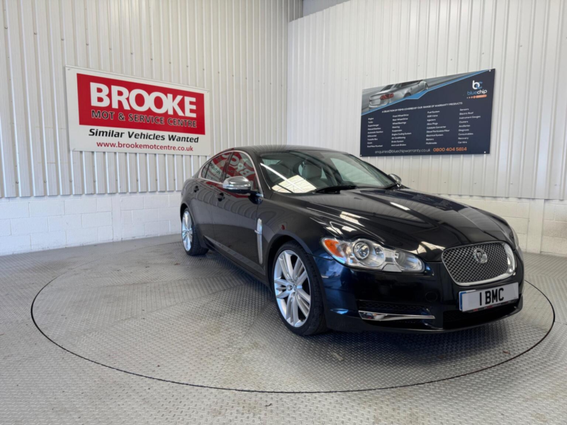 2011 Jaguar Xf 3.0d V6 Portfolio Auto Euro 5 4dr in Black — image 1