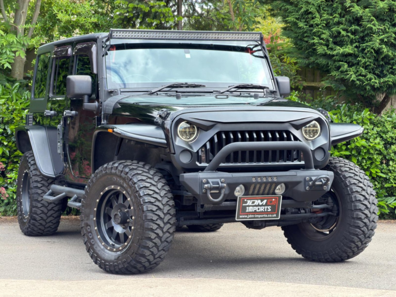 2011 Jeep Wrangler Unlimited Sahara 3.8l V6 in Black — image 1