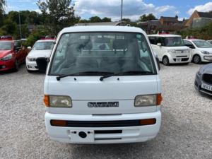 1996 Suzuki Carry Dropside 0.7 4WD Kei Pick Up Truck in White — image 2