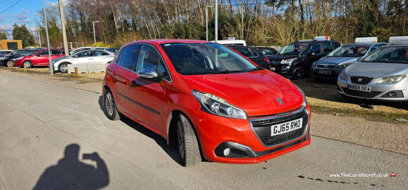2015 Peugeot 208 1.6 Bluehdi Allure in Orange — image 1