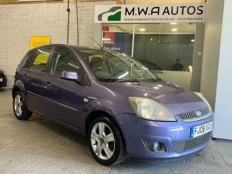 2009 Ford Fiesta 1.4 Zetec Climate Hatchback 5dr Petrol Manual (147 G/km, 79 Bhp) in Purple — image 1