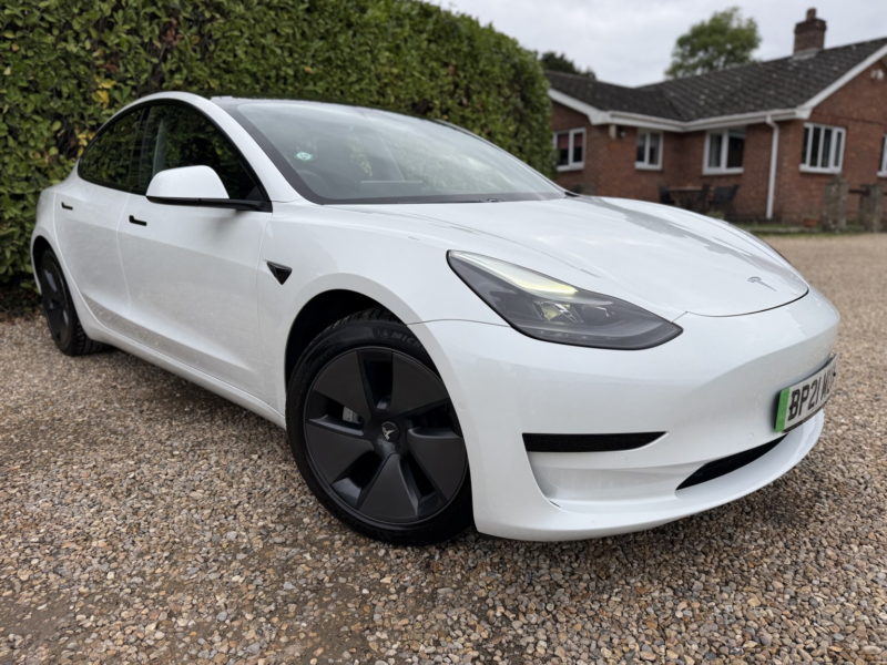 2021 Tesla Model 3 Standard Range Plus in White — image 1