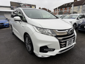 2018 Honda Odyssey 2.0 Hybrid 7 Seats Fresh Import Verified Mile Finance Avb in White — image 2
