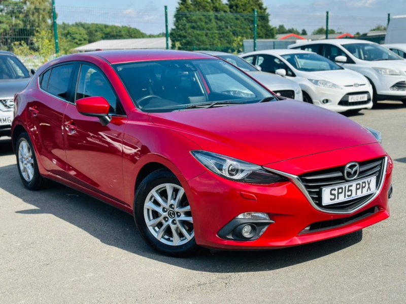 2015 Mazda Mazda3 2.0 Skyactiv-G Se-L in Red — image 1