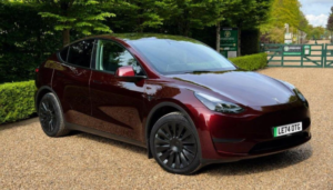 2025 Tesla Model Y Long Range Auto Rwd 5dr in Red — image 2