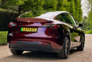 2025 Tesla Model Y Long Range Auto Rwd 5dr in Red — image 3