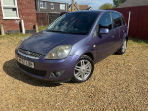 2007 Ford Fiesta 1.4 Ghia Hatchback 5dr Petrol Manual (147 G/km, 79 Bhp) in Purple — image 2