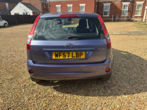2007 Ford Fiesta 1.4 Ghia Hatchback 5dr Petrol Manual (147 G/km, 79 Bhp) in Purple — image 4