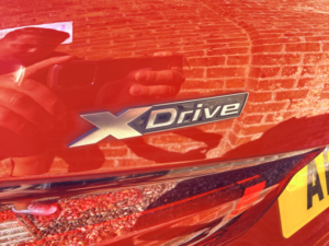 2021 BMW 1 Series 2.0 M135i Xdrive in Red — image 2