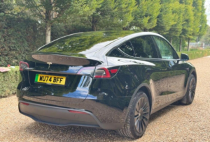 2024 Tesla Model Y Long Range Auto Rwd 5dr in Black — image 3