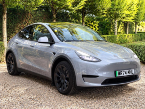 2024 Tesla Model Y Long Range Auto Rwd 5dr in Grey — image 2