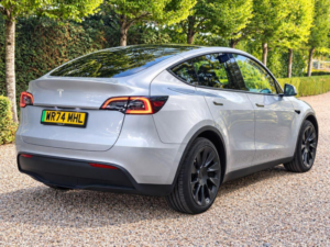 2024 Tesla Model Y Long Range Auto Rwd 5dr in Grey — image 3
