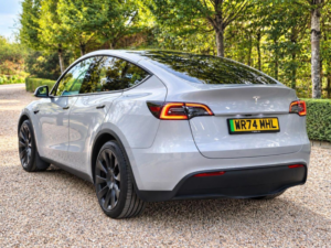 2024 Tesla Model Y Long Range Auto Rwd 5dr in Grey — image 4