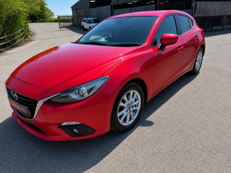 2015 Mazda Mazda3 2.0 Skyactiv-G Se-L Nav in Red — image 1
