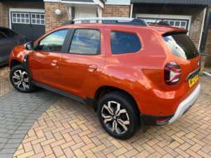 2022 Dacia Duster 1.3 Tce Prestige SUV 5dr Petrol Manual Euro 6 (s/s) (130 Ps) in Orange — image 3