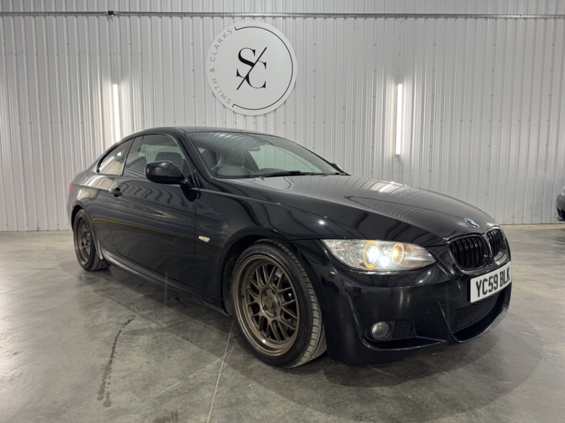 2009 BMW 3 Series 3.0 330i M Sport Highline Coupe in Black — image 1