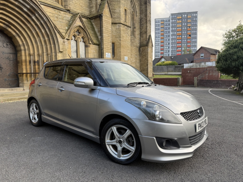 2013 Suzuki Swift Hatchback (2010 - 2017) in Gold — image 1